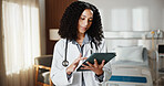 Doctor, woman and scroll on tablet in hospital with internet for schedule, planning and medical research. African person, tech and Telehealth app for healthcare, information and advice on website