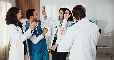 Buy stock photo Healthcare, doctors and nurses in hospital with high five, teamwork achievement and collaboration. Success, hand gesture and medical people in clinic with support, applause and excited for good news