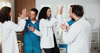 Buy stock photo Healthcare, doctors and nurses in clinic with high five, teamwork achievement and collaboration. Success, hand gesture and medical people in hospital with support, applause and excited for good news