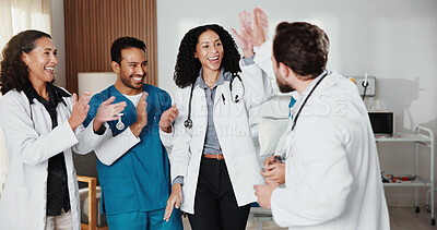 Buy stock photo Success, doctors and nurses in clinic with high five, teamwork achievement and collaboration. Healthcare, hand gesture and medical people in hospital with support, applause and excited for good news