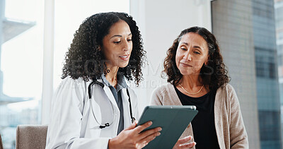 Buy stock photo Clinic, patient and doctor with tablet, appointment and explaining medical diagnosis and healthcare. Hospital, health professional and happy women with technology, checkup and reading test results