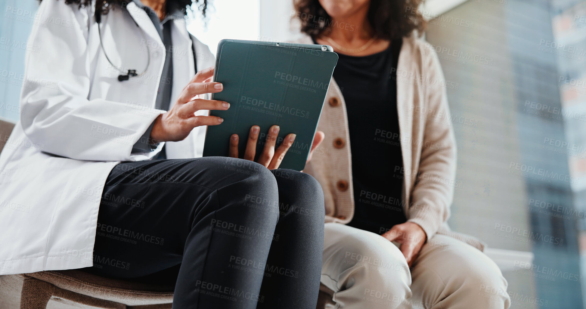 Buy stock photo Clinic, patient and doctor with tablet, hands and explaining medical diagnosis or report on website. Hospital, healthcare professional and women with technology, consultation and reading test results