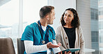 Clinic, patient and nurse with tablet, discussion and explaining medical diagnosis and report on web. Hospital, healthcare professional and happy people with technology, consultation and test results