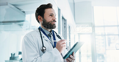 Buy stock photo Thinking, man and doctor with tablet in hospital for telehealth, service or medical advice. Digital technology, planning and healthcare worker with online consultation, research or patient report.