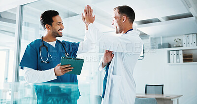 Buy stock photo Doctor, nurse and high five in hospital with tablet, medical research success and collaboration goals. Happy, men and celebration in clinic with tech, achievement and partnership for healthcare team.