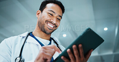 Buy stock photo Reading, man and doctor with tablet in hospital for telehealth, service or medical advice. Digital technology, happy and healthcare worker with online consultation, research or patient report.