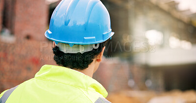 Buy stock photo Construction, back or man on site with inspection, safety check or quality control in building project. Space, ppe or engineer with hardhat, progress track or evaluation in industrial compliance.