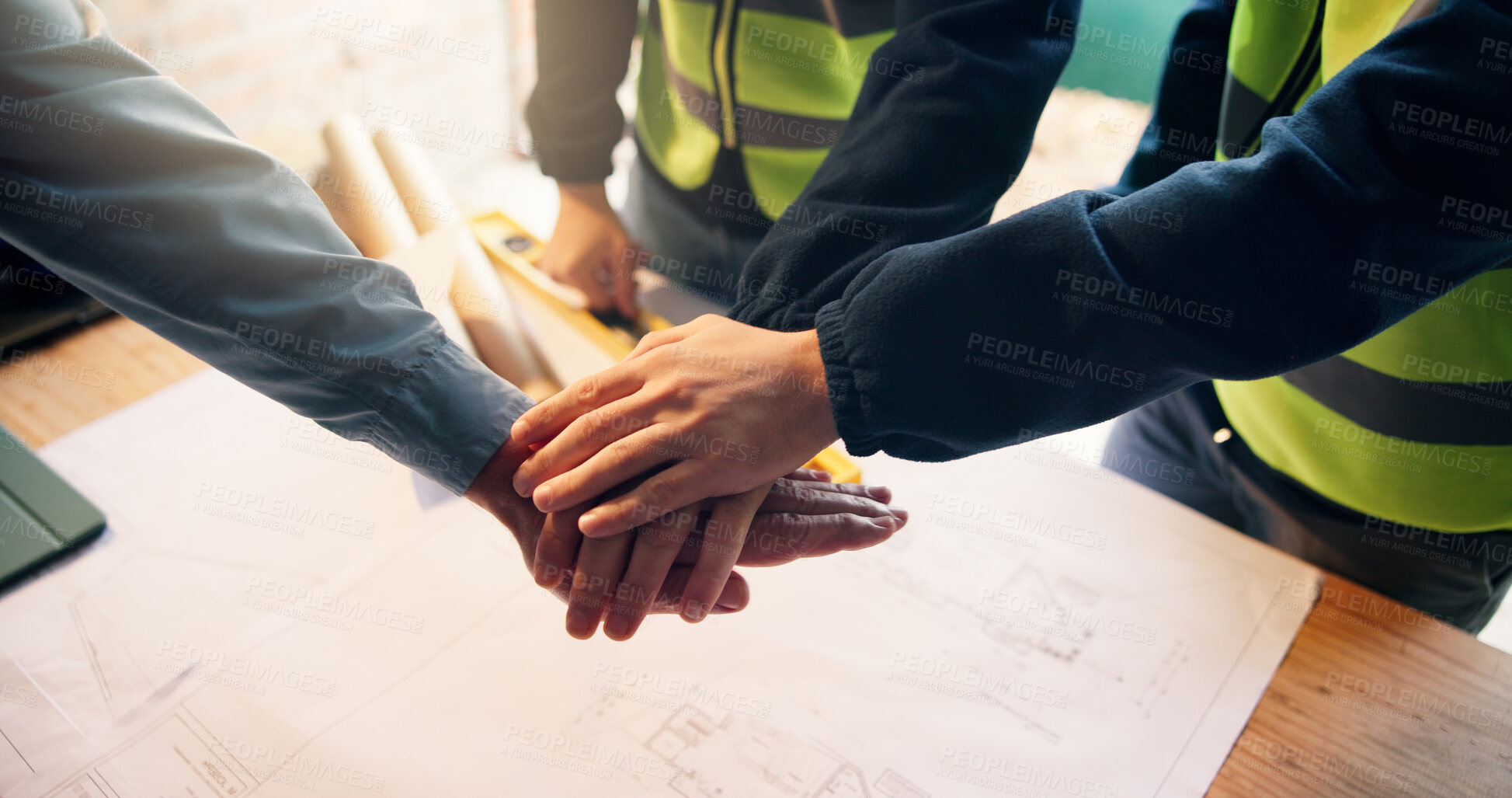 Buy stock photo Hands, stack and architecture with blueprint for mission, service and team planning at job site. Construction, floorplan and people with unity, support and collaboration for property development