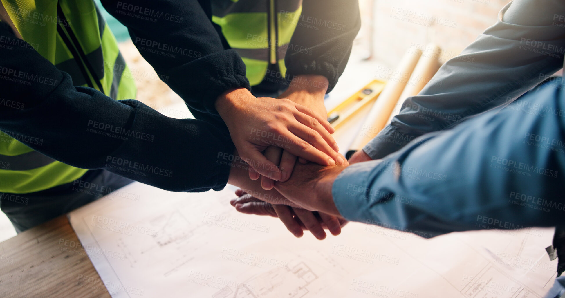 Buy stock photo Hand stack, architecture and together by blueprint for mission, service and team planning at job site. Construction, floorplan and people with unity, support or collaboration for property development