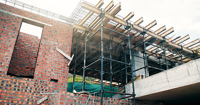 Buy stock photo Concrete, construction or scaffolding with brick wall for strength, reinforcement or architecture. Empty, iron or bars with cement or beams for durable building, masonry or structure industry on site