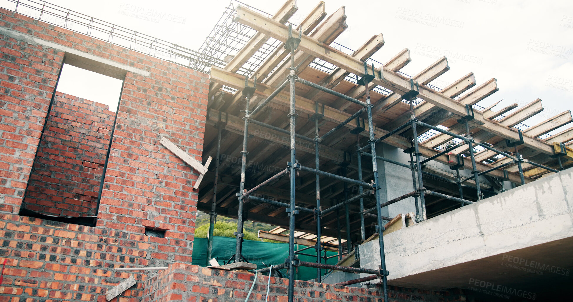 Buy stock photo Concrete, construction or scaffolding with brick wall for strength, reinforcement or architecture. Empty, iron or bars with cement or beams for durable building, masonry or structure industry on site