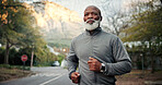 Serious, man and running on road, active and endurance for physical activity or cardio for wellness. Outdoor, mature runner and black person on street, fitness and exercise routine to lose weight