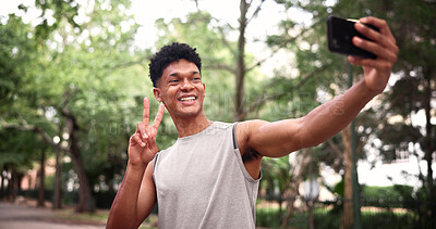 Buy stock photo Fitness, athlete and man at park, selfie and peace sign for profile picture after physical activity. Outdoor, runner and happy person with hand gesture, photography and memory on workout break
