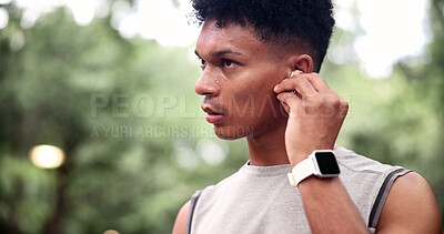 Buy stock photo Fitness, earphones or man in park with music, online radio or song subscription for workout activity. Space, athlete or person with tech, sound track streaming or audio listening for outdoor exercise