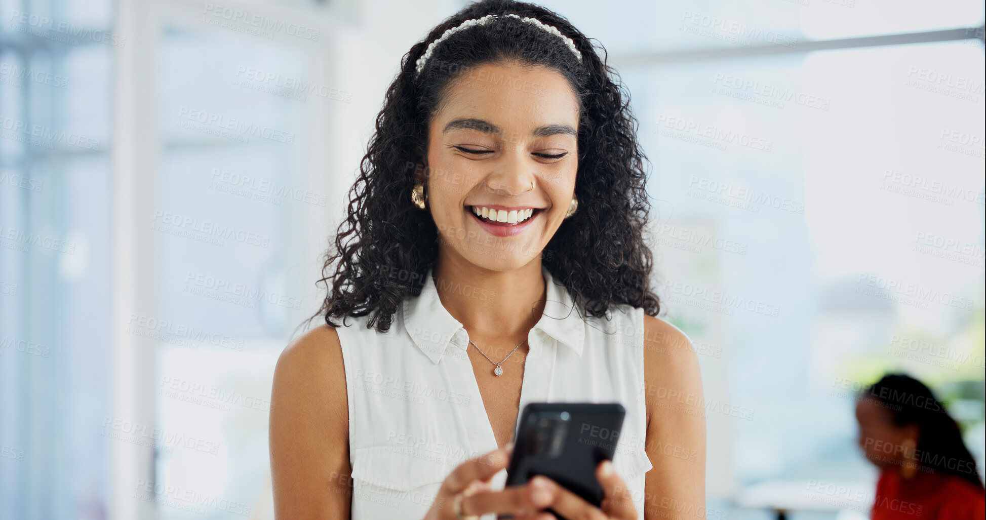 Buy stock photo Phone, laugh or woman in office, reading notification or message for venue budget approval. Mobile, event planner or happy person with business email, coworking or vendor coordination with funny text