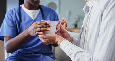 Buy stock photo Hands, nurse and patient with coffee for homecare, assistance and support with people in retirement. Caregiver, senior person and drink for refreshment, thirst and wellness for health at house
