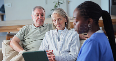 Buy stock photo Nurse, elderly couple and consultation in home with tablet, healthcare results or cancer diagnosis. Retirement, man or woman with caregiver for medical info, treatment options or discussion with tech