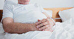 Hands, old man and rest in bed at hospital, medical results and recovery for chronic illness. Thinking, senior person or relax at facility for treatment, cancer diagnosis and geriatric rehabilitation