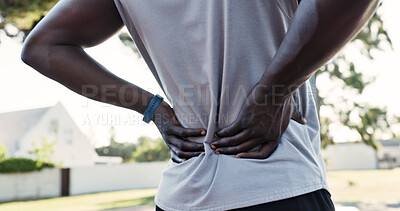 Buy stock photo Hands, person and back pain with accident in park for exercise, fitness or training injury. Tension, sports athlete and massage muscle for fibromyalgia, arthritis ache or joint discomfort outdoor