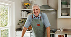Portrait, cooking and senior man in kitchen with smile, retirement wellness and apron for lunch recipe. Happy, pensioner and male person in home with meal preparation, healthy diet and nutrition.