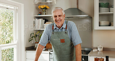 Buy stock photo Portrait, cooking and senior man in kitchen with smile, retirement wellness and apron for lunch recipe. Happy, pensioner and male person in home with meal preparation, healthy diet and nutrition.