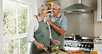 Cooking, support and old couple in kitchen with healthy food, bonding together and laugh for joke. Happy, married senior people and meal prep in house with love, nutrition and retirement wellness.