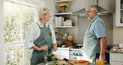 Buy stock photo Senior, couple and cooking in kitchen with healthy food, retirement wellness or laugh for funny story. Happy, married elderly people or meal prep in home with nutrition, love or humor with vegetables