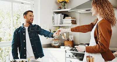 Buy stock photo Love, dance and cooking with couple in kitchen for romance, support and connection. Happy, energy and lunch prep with man and woman in home for marriage commitment, music and movement together