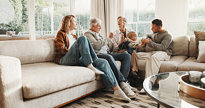 Buy stock photo Relax, family and grandparents with baby on sofa for bonding, playing and connection for visit. Home, generations and mom, dad and senior parents with child for love, care and relationship on weekend