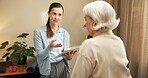 Physiotherapist, senior and woman with clipboard in private practice for health advice or session. Female person, specialist or therapist with elderly client for visit, checkup or wellness in room