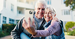 Fitness, happy and old couple outdoor with selfie, social media post and memories for retirement. Senior people, smile and photography by apartment building with workout, relationship or online blog.