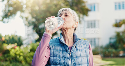 Buy stock photo Fitness, drink and senior woman in city for rest, workout recovery and hydration with bottle. Exercise break, active retirement and person with water for health, beverage and thirsty with runner
