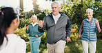 Exercise, man and old people outdoor with personal trainer, movement together and smile for wellness. Fitness coach, senior group and happy in garden with cardio workout, guidance or retirement club.