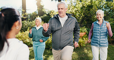 Buy stock photo Exercise, man and old people outdoor with personal trainer, movement together and smile for wellness. Fitness coach, senior group and happy in garden with cardio workout, guidance or retirement club.