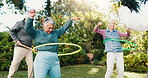 Plastic ring, friends and elderly people in park for fitness, body mobility and outdoor for wellness. Happy, senior group and warm up toy for training, exercise or retirement health in nature