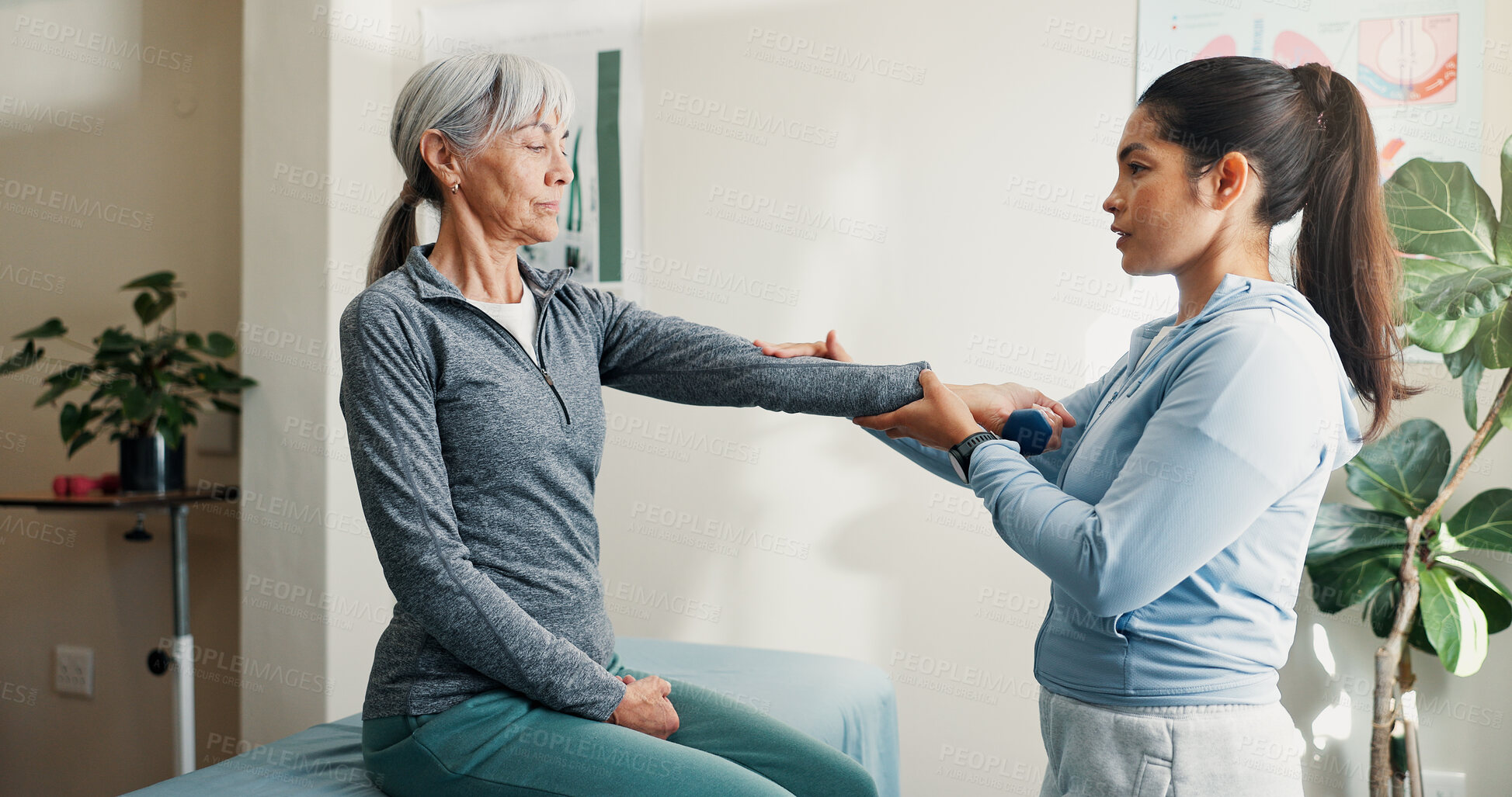 Buy stock photo Physio, checkup and old woman in office with arm pain, assessment and mobility recovery. Physiotherapist, stretching and senior person with dumbbells for physiotherapy, evaluation and rehabilitation