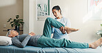 Physio, helping and stretching leg with old woman, assessment and recovery from injury. Physiotherapist, guidance and senior person at clinic for physiotherapy, medical evaluation and rehabilitation