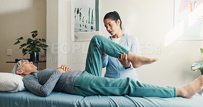 Buy stock photo Physio, helping and stretching leg with old woman, assessment and recovery from injury. Physiotherapist, guidance and senior person at clinic for physiotherapy, medical evaluation and rehabilitation