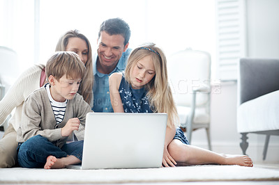 Buy stock photo Parents, smile and kids with laptop on floor, relax and streaming movies with subscription in house. Online, film and happy people with children, bonding or family with tech for entertainment in home
