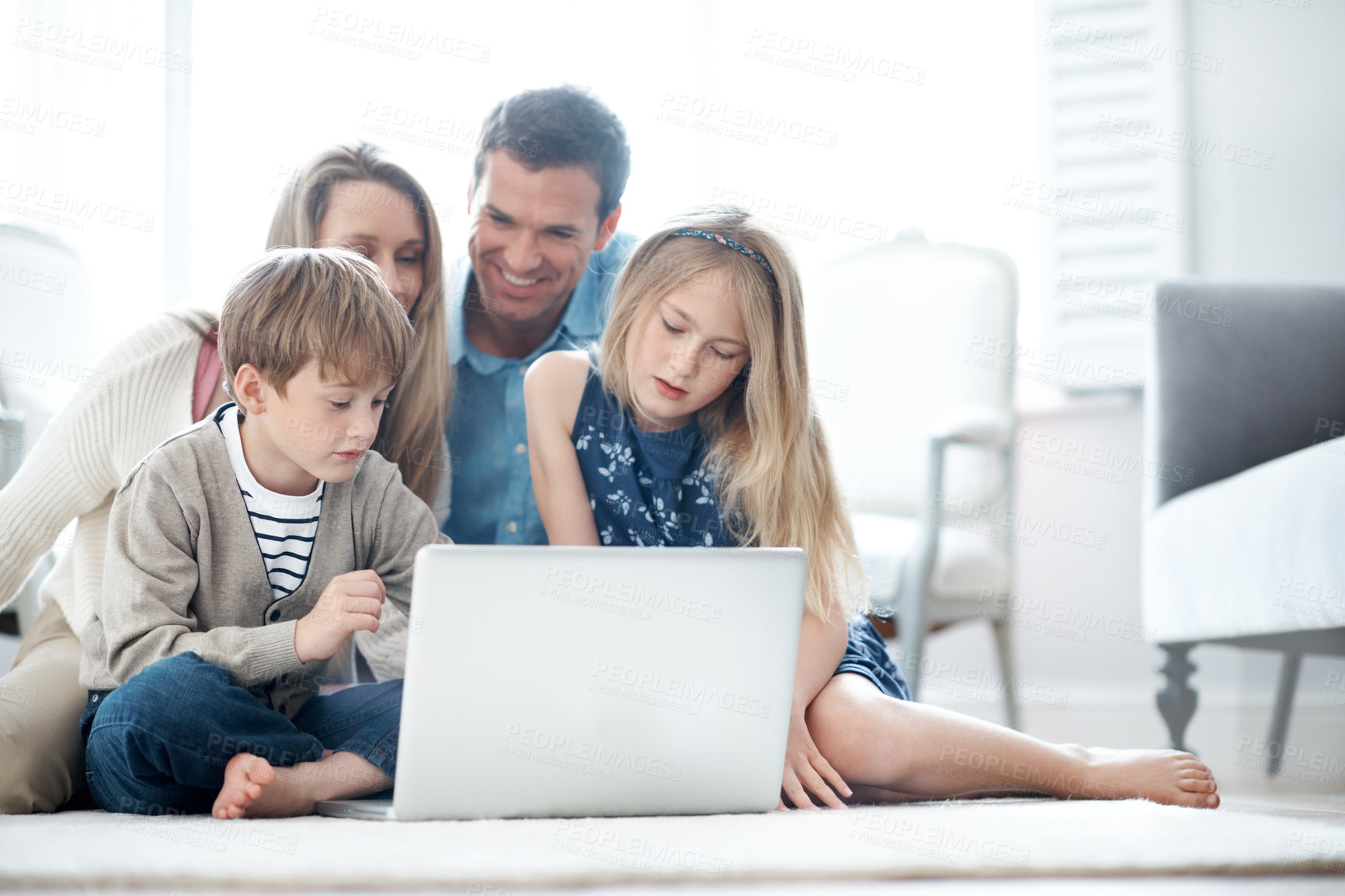 Buy stock photo Parents, smile and kids with laptop on floor, relax and streaming movies with subscription in house. Online, film and happy people with children, bonding or family with tech for entertainment in home