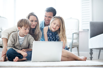 Buy stock photo Parents, online and children with laptop in house, love or watching film with subscription in lounge. Streaming, movie and happy people with kids, family and relax with tech for entertainment in home