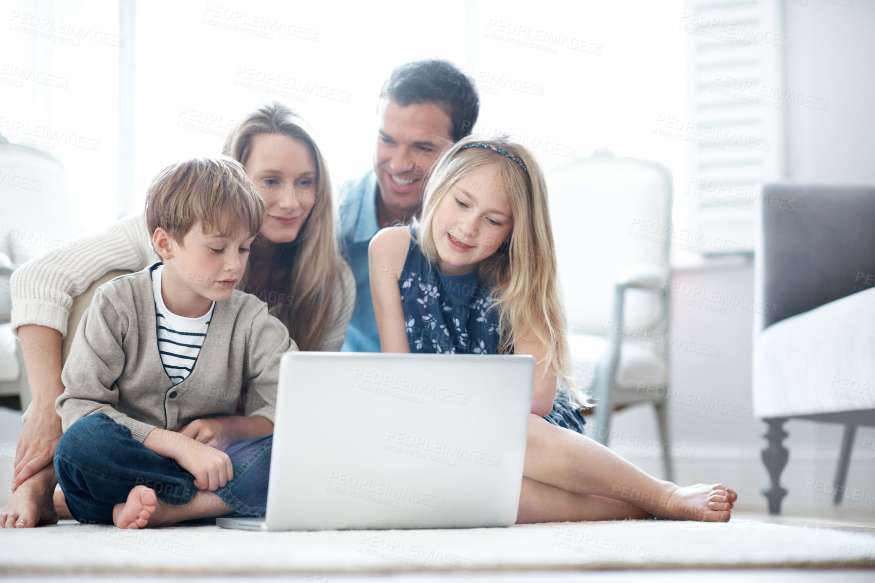 Buy stock photo Parents, online and children with laptop in house, love or watching film with subscription in lounge. Streaming, movie and happy people with kids, family and relax with tech for entertainment in home