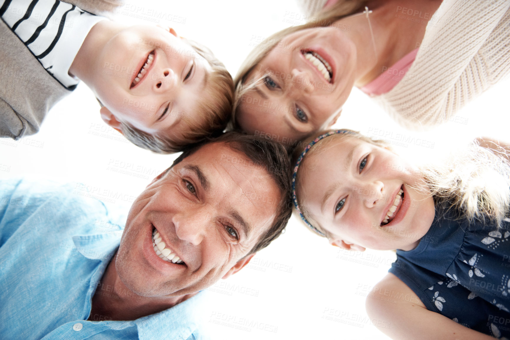 Buy stock photo Portrait, circle and below of parents with children for bonding, relationship and family connection. Happy, huddle and kids with mom, dad and siblings for love, trust and support for development