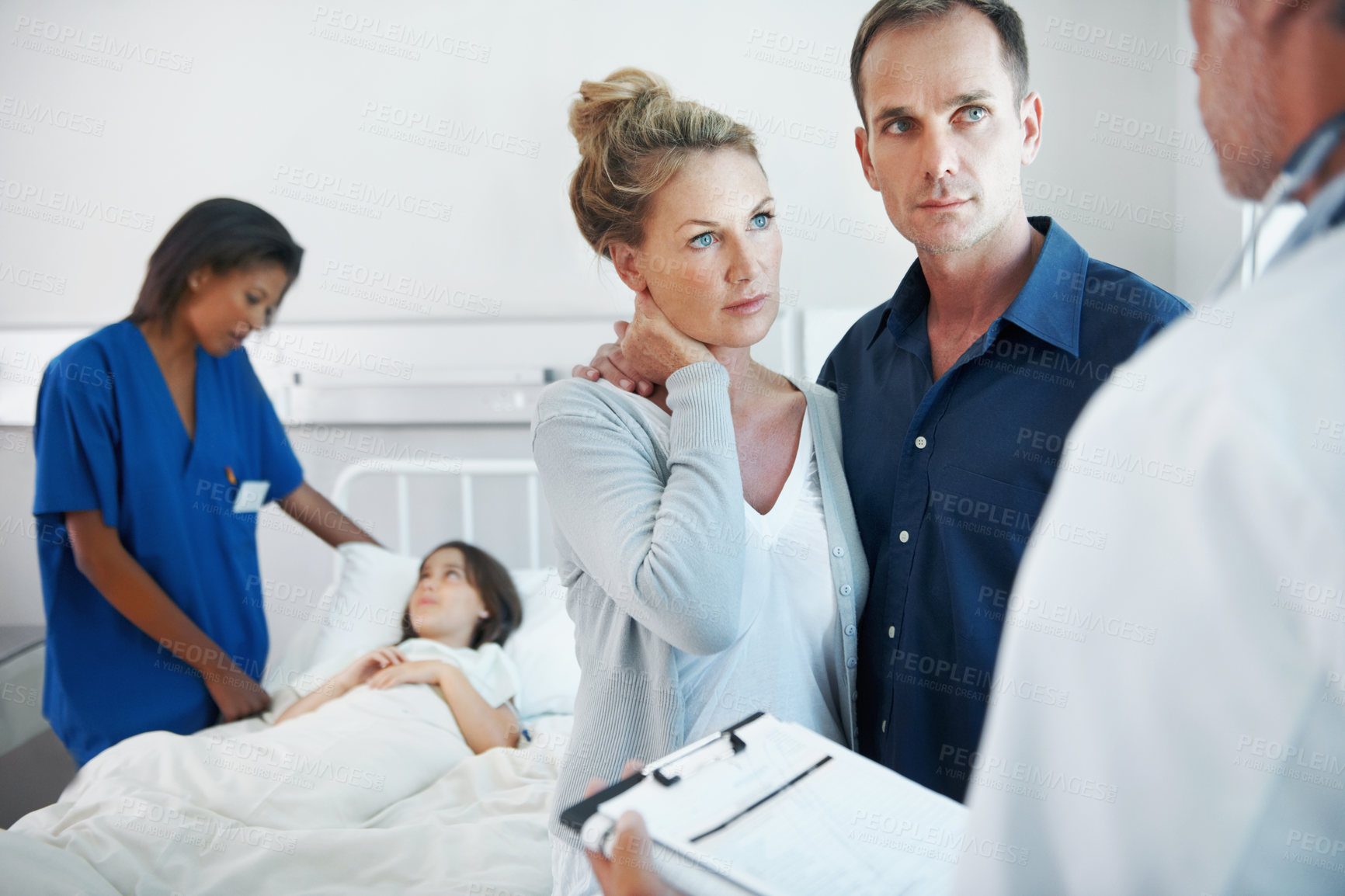 Buy stock photo Clipboard, consulting and pediatrician speaking to parents in hospital for care of daughter. Concern, feedback and news with doctor talking to people in clinic for child healthcare or medical report