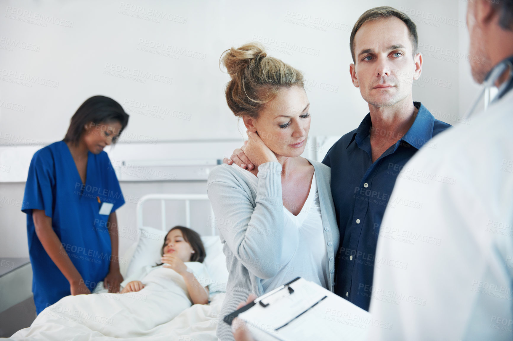 Buy stock photo Consulting, news and pediatrician speaking to parents in hospital for care of daughter. Clipboard, concern and feedback with doctor talking to people in clinic for child healthcare or medical report