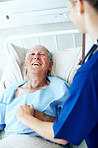 Sharing a light-hearted moment in the ward
