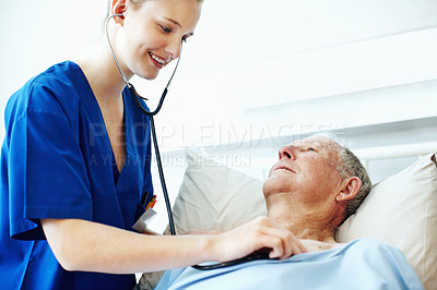 Buy stock photo Stethoscope, hospital and nurse with senior patient for check up, exam and medical service for wellness. Healthcare, happy and woman with man for heartbeat, breath and consulting for surgery results