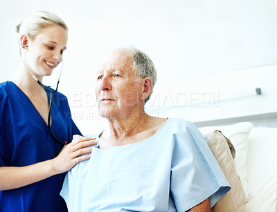 Buy stock photo Stethoscope, listen and nurse with senior man for hospital check up, wellness and medical service. Healthcare, happy and woman with patient heartbeat, breathing and consulting for surgery results
