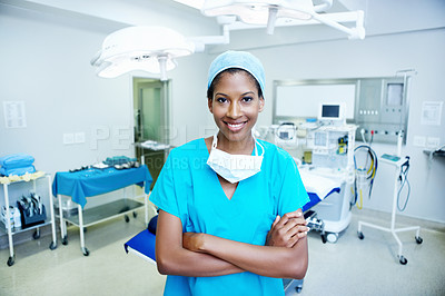 Buy stock photo Surgeon, health or woman with arms crossed in theater for medical procedure, integrity or trust. Doctor portrait, black person or happy in scrubs for healthcare surgery, operation specialist or pride
