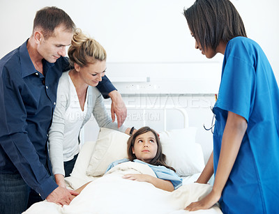 Buy stock photo Girl, parents and hospital bed with nurse for recovery, immune system support or pediatrics. Child, diagnosis facility and family in clinic for treatment, service and medical consulting or assessment
